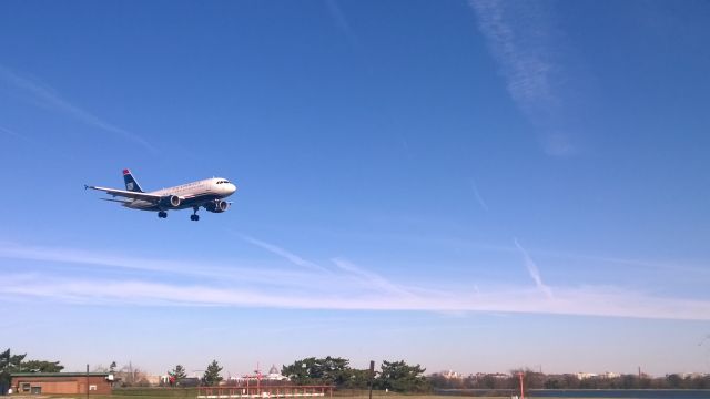 Airbus A319 (N768US) - About to land on RWY18. Taken from Gravelly Point.