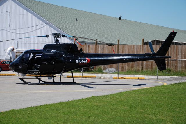 C-GHAQ — - Torontos Global Television News chopper parked at its base at Downsview Airport, Toronto.