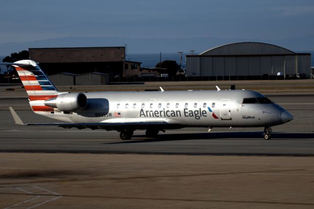 Canadair Regional Jet CRJ-200 (N955SW) - KMRY - departing the terminal to Runway 28 for LAX.