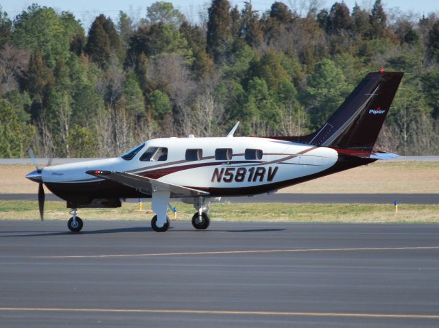 Piper Malibu Mirage (N581RV) - AC CONTROLS CO INC taxxing in - 2/1/13