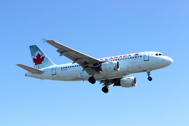 Airbus A319 (C-FZUL) - Seconds before touching down at Montreal airport