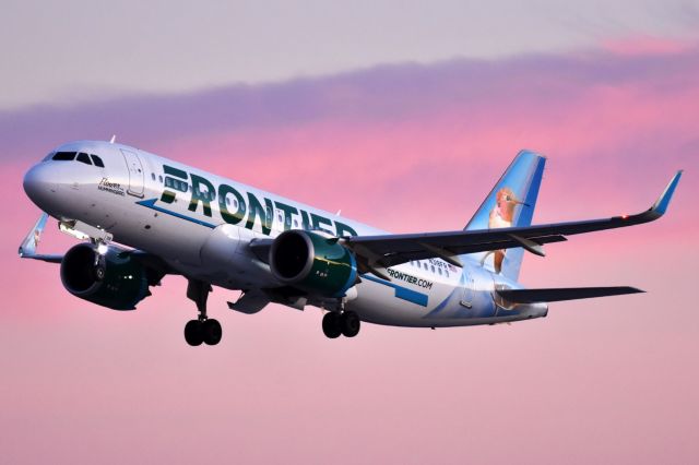 Airbus A320neo (N318FR) - Frontier (Flower the Hummingbird Livery) departing YYC into an awesome pink sky at sunset on Jan 13.