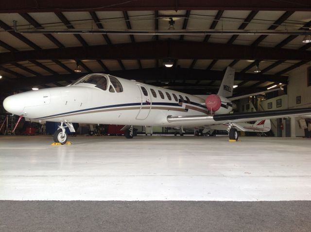 Cessna Citation V (N50EL) - A Cessna Citation V sitting pretty in a hangar at Fort-Collins-Loveland Municiple. Aircraft is owned by a local law firm. Photo taken from IPad 3rd gen.