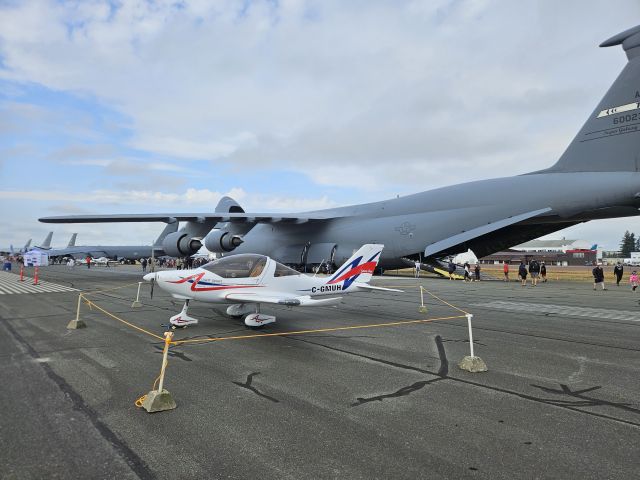 TL ULTRALIGHT Sting (C-GMUH) - David vs Goliath.  Sting S4 in front of Super Galaxy at Abbotsford Airshow.
