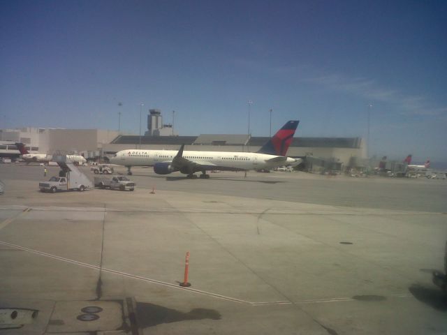 — — - Delta 757 WL on the apron at KSFO. Picture taken from aboard AWE 658 (A320 service from SFO-PHL). Date 4-16-12. Sorry for the low quality.