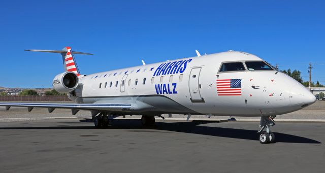 Canadair Regional Jet CRJ-200 (N907SA) - Another political campaign charter, N907SA, was on the Stellar ramp for an RON stay in Reno.br /This CRJ is being used to transport the Second Gentleman of the United States (SGOTUS) Doug Emhoff (Vice President Kamala Harris' husband) as he campaigns for his wife in her bid to become the first female POTUS.  If she is successful, Mr. Emhoff will go down in history as the first-ever First Gentleman of the United States (FGOTUS).  