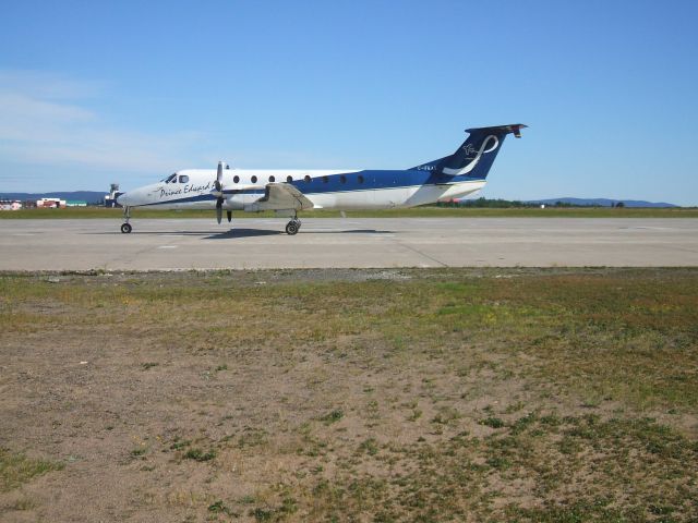 Beechcraft 1900 (C-FKAX) - Parked at Woodward Aviation F.B.O.  Goose Airport Lab. 21/8/8