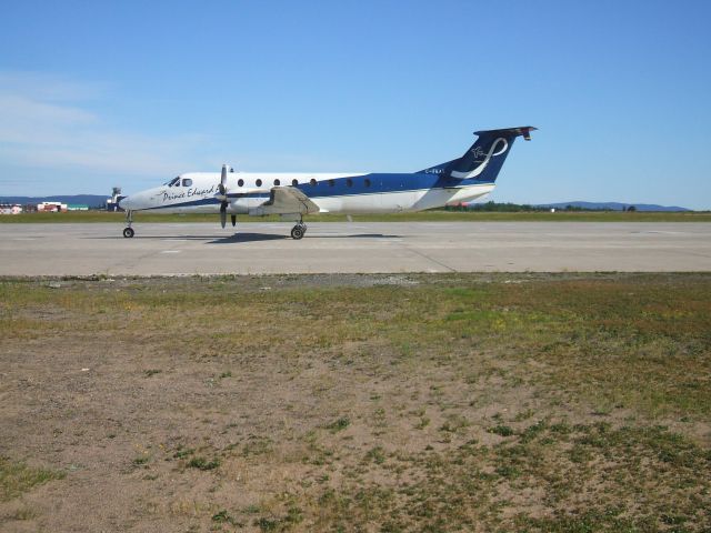 Beechcraft 1900 (C-FKAX) - Parked at Woodward Aviation F.B.O.  Goose Airport Lab. 21/8/8