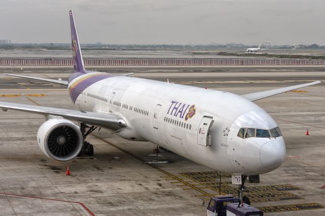 BOEING 777-300ER (HS-TKP) - 26th December, 2024:  Parked on the ramp by the new satellite terminal at Bangkok Suvarnabhumi prior to her departure to Frankfurt as flight TG 922.