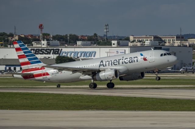 Airbus A320 (N673AW) - Departing 13R