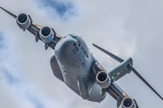 Boeing Globemaster III — - This photo is of a C17 doing a low and slow pass over the 2021 Sun N Fun aerospace expo in Lakeland Florida. I used 600mm of Canon lens and the camera settings were 1/2000 F9 ISO 500. Please check out my other photography. Positive votes and comments are always appreciated. Questions about this photo can be sent to Info@FlewShots.com