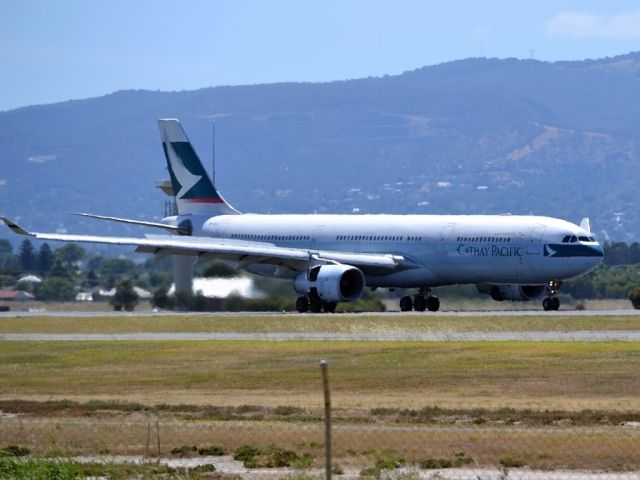 Airbus A330-300 (B-HLQ) - Braking hard on runway 23, on arrival from Hong Kong.