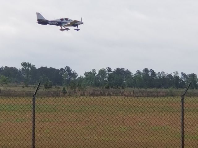 Cessna 400 (N516VK) - Landing N516VK for touch and go training on Runway 19 at KFLO 05/15/2018