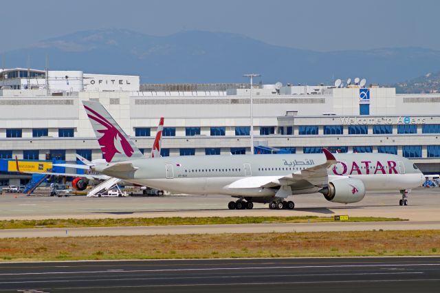 Airbus A350-900 (A7-ALA) - Qatar A350 taxes to gate with Welcome to Athens logo at the background