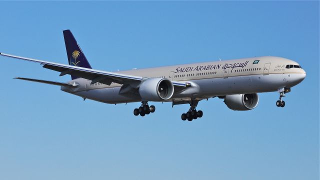 BOEING 777-300 (HZ-AK13) - BOE228 on final approach to runway 16R to complete a flight test on 2/7/12.