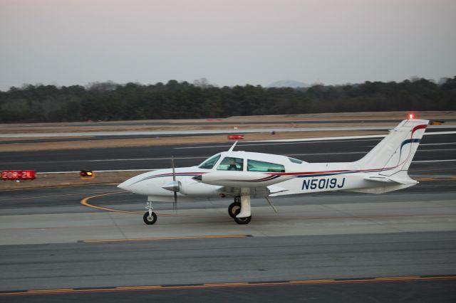 Cessna 310 (N5019J) - Taxiing at PDK on 02/16/2011