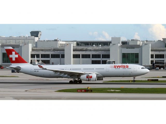 Airbus A330-300 (HB-JHI) - A heavy loaded Airbus A330 taking off. Raw photo courtesy of LEARJETMIAMI - thank you!