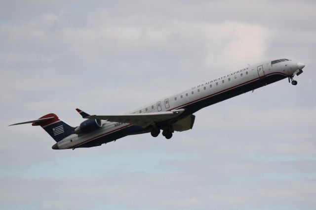 Canadair Regional Jet CRJ-900 (N912FJ) - US Air Flight 2884 (N912FJ) operated by Mesa departs Sarasota-Bradenton International Airport enroute to Charlotte-Douglas International Airport