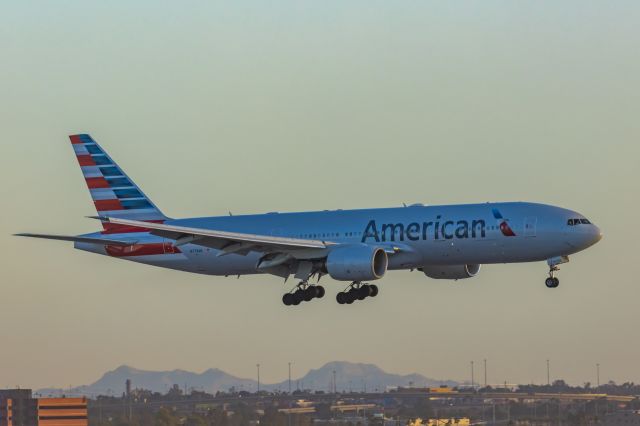 Boeing 777-200 (N779AN) - An American Airlines 777-200 landing at PHX on 2/12/23 during the Super Bowl rush. Taken with a Canon R7 and Canon EF 100-400 II L lens.