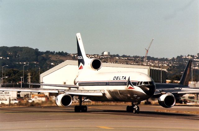 Lockheed L-1011 TriStar (N766DA) - KSFO- N766DA set to roll onto 1R for ATL. Dec 1999 photo.