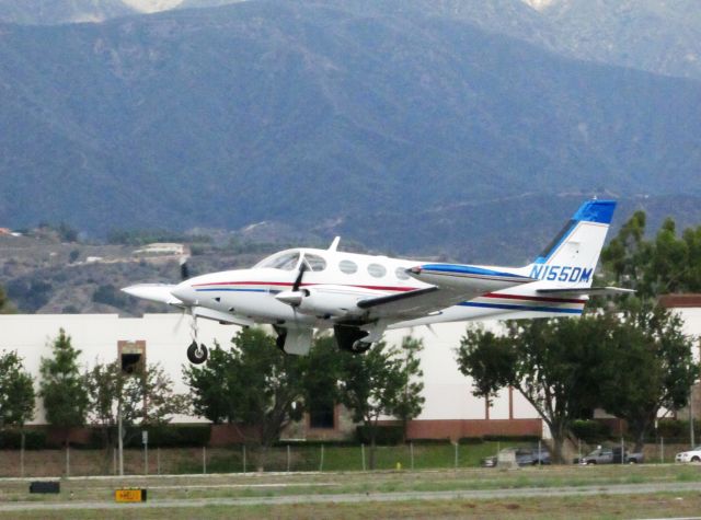 Cessna 340 (N155DM) - Taking off RWY 26L