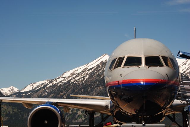 — — - UA 757 at KJAC