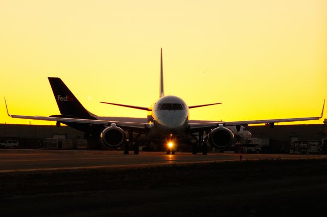 Embraer ERJ-190 (C-FFYJ) - Taxiing to Rwy 25 for a trip to YEG/YEG when the sun was completely below the western horizon.