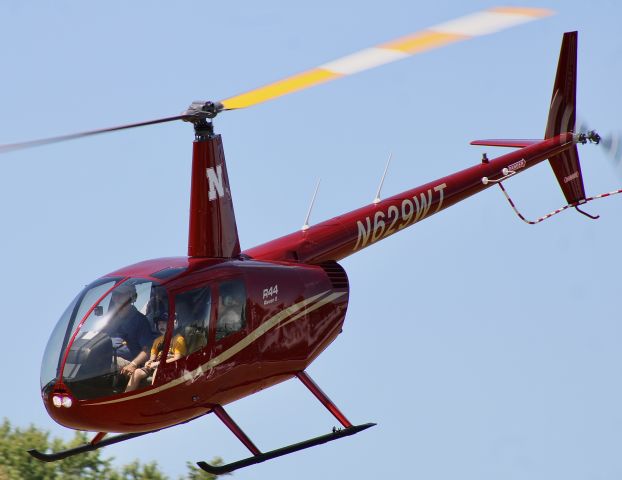 Robinson R-44 (N629WT) - A brand new Robinson R44 flying around the light-sport field at Osh. br /br /7/28/23