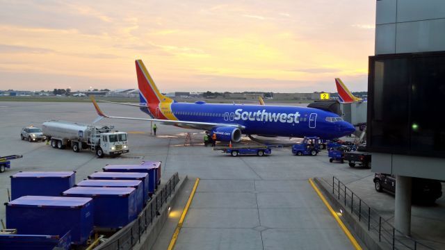 Boeing 737-800 (N8686A) - Early morning Southwest flights getting ready at Bradley Airfield