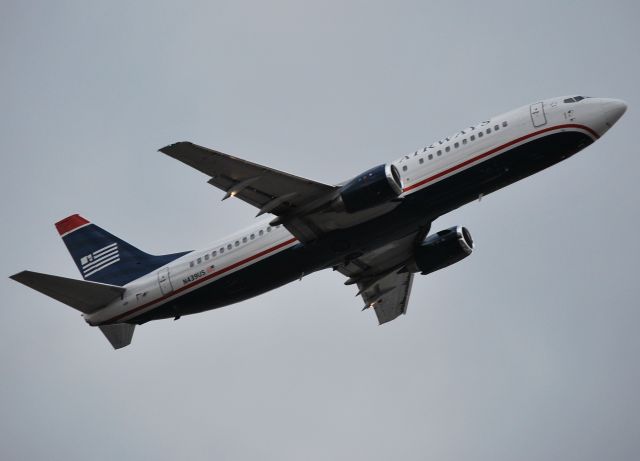 BOEING 737-400 (N439US) - Departing 36R - 2/23/10