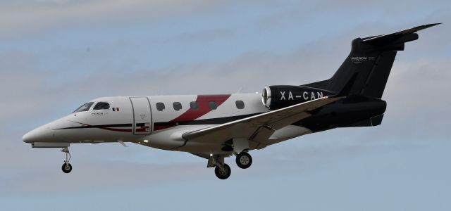 Embraer Phenom 300 (XA-CAN) - About to land at Dulles airport