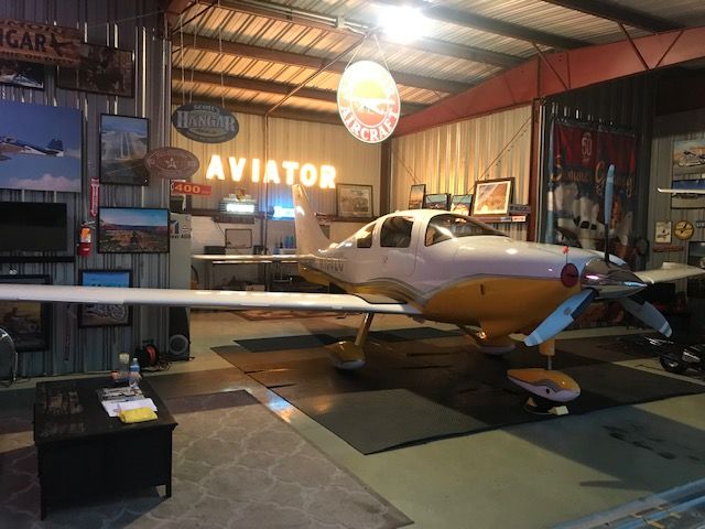 Cessna 400 (N1302C) - My 400 in my hangar as the sun goes down at KDVT