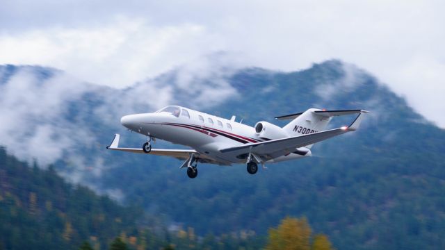 Cessna Citation CJ1 (N300BV) - A winglet-equipped CJ1 departs Sandpoint on a misty fall afternoon.