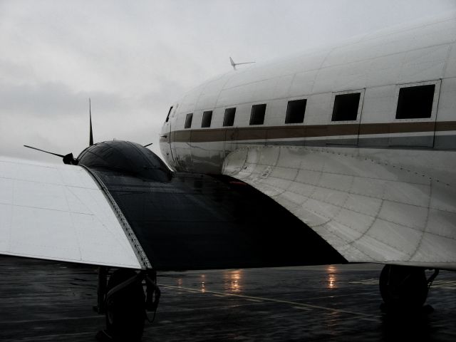 Douglas DC-3 (turbine) (N467KS) - Alexandra, our "modernized" Douglas DC-3 operated by MFI (Missionary Flights International), on the tarmac at KFXE getting ready to fly us at around 0800 to the Bahamas on our missionary school trip on 1/4/12. What wonderful weather for flying... :P