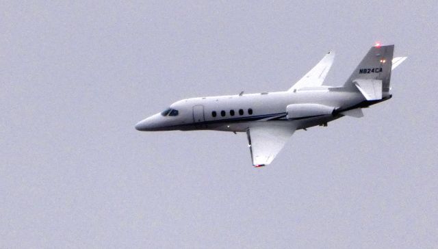 Cessna Citation Sovereign (N824CA) - Shortly after departure in the distance is an 2018 Cessna Latitude in the Winter of 2019.