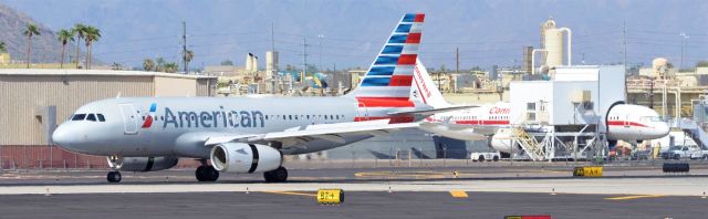 Airbus A319 (N827AW) - PHX rwy 26 arrival 26AUG19 110 degrees