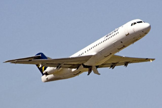 Fokker 100 (VH-XWP) - Getting airborne off runway 23 and heading to a regional destination, on the last day of the Australian summer. Thursday 28th February 2013.