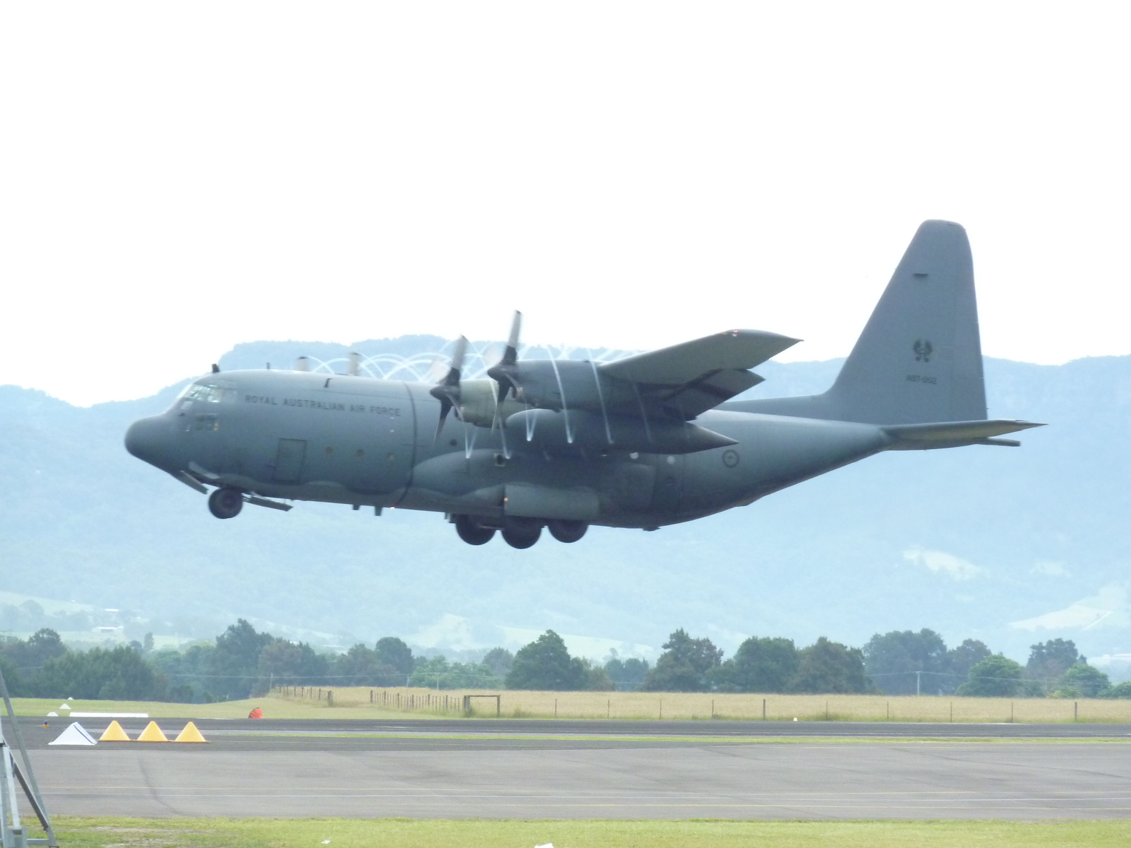 — — - Royal Australian Air Force (RAAF) aircraft. Hercules departing Albion Park (100 kms south of Sydney NSW) Airport after Wings Over Illawarra airshow February 27, 2011