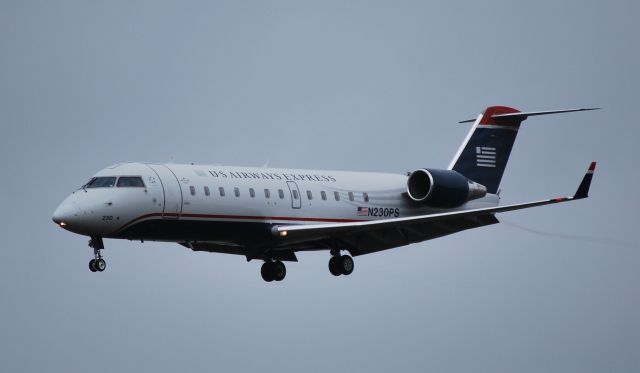 Canadair Regional Jet CRJ-200 (N230PS) - On final for runway 18L - 10/23/09