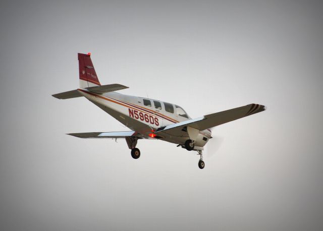 N596DS — - 2007 60th Anniversary Edition Beechcraft Bonanza (Model G36). Photo taken while on final approach into KBEC (Beech Factory Airport) RNAV GPS RWY19. Wichita, KS 02/18/2018