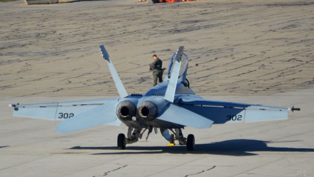 McDonnell Douglas FA-18 Hornet (16-8912) - Suiting up for flight