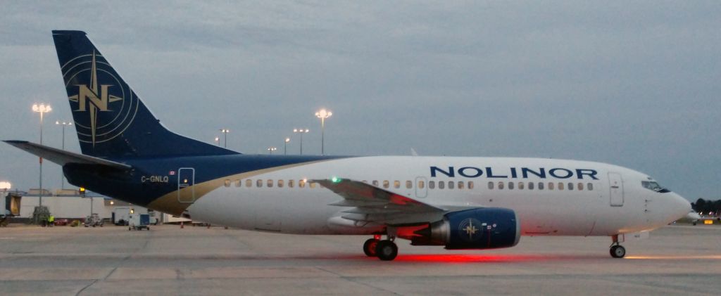 BOEING 737-300 (C-GNLQ) - Taxing to the hard stand after bringing the Laval Rocket's hockey team to CLT to play the Checkersbr /br /11/24/18