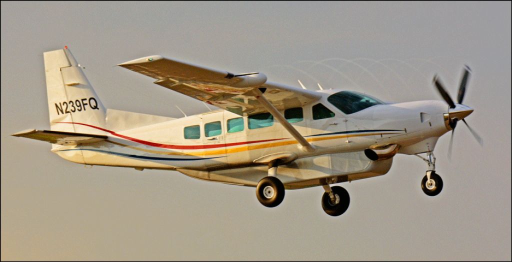 Cessna Caravan (N239FQ) - Look close to see the propeller vortices