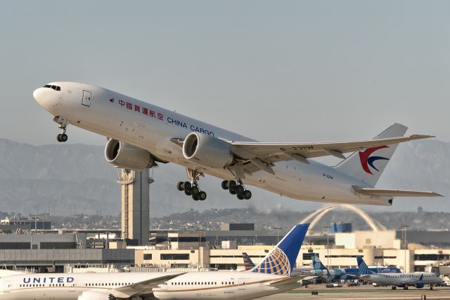 BOEING 777-200LR (B-221W) - 12th August, 2024: Cargo flight CK 222 headed to Shanghai PuDong is seen rotating past the iconic control tower and the space arc at LAX. 