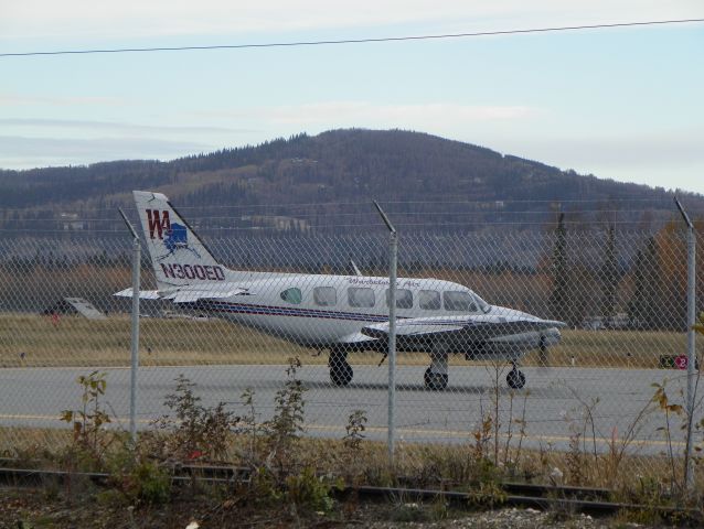 N300ED — - Navajo doing engine run ups and cycling the props. Notice the windows. Trying to warm up before going onto the runway.