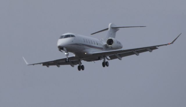 Canadair Challenger 350 (N738QS) - A 2017 Bombardier Challenger 350 on right downwind in the Spring of 2019.