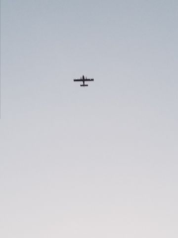 Canadair CL-415 SuperScooper (N386AC) - Flying overhead at the end of a fire day in central Washington. 