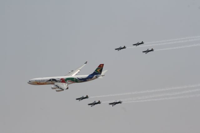 Airbus A340-300 (ZS-SXO) - SAA A 340-300 display with the SAAF Silver Falcons Pilatus PC-6 at AAD air show