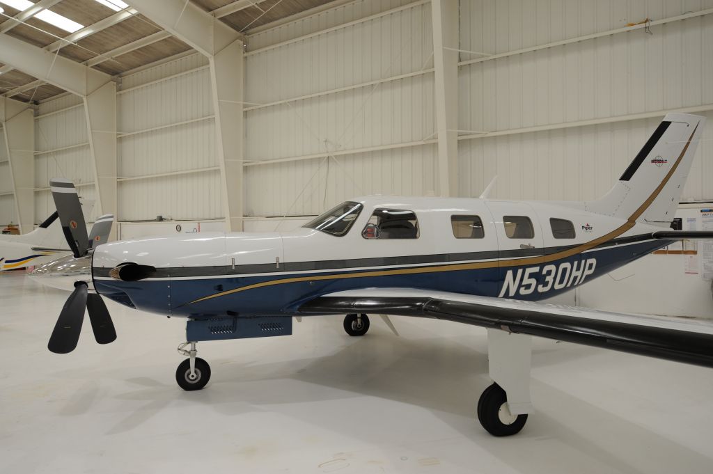 Piper Malibu Mirage (N530HP) - N530HP in High Performance Aircraft hangar at KSEE airport