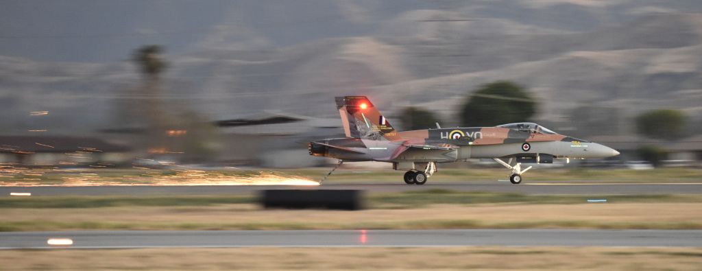 McDonnell Douglas FA-18 Hornet (18-8761) - Landing at dusk with the tail hook down